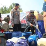 Polres Kuningan Salurkan Air Bersih dan Pengobatan Gratis di Cihanjaro